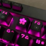 A gallery of the elegant Glowing Sakura Keycap ESC, highlighting its illuminated cherry blossom motif and premium backlit ABS from various artistic perspective.