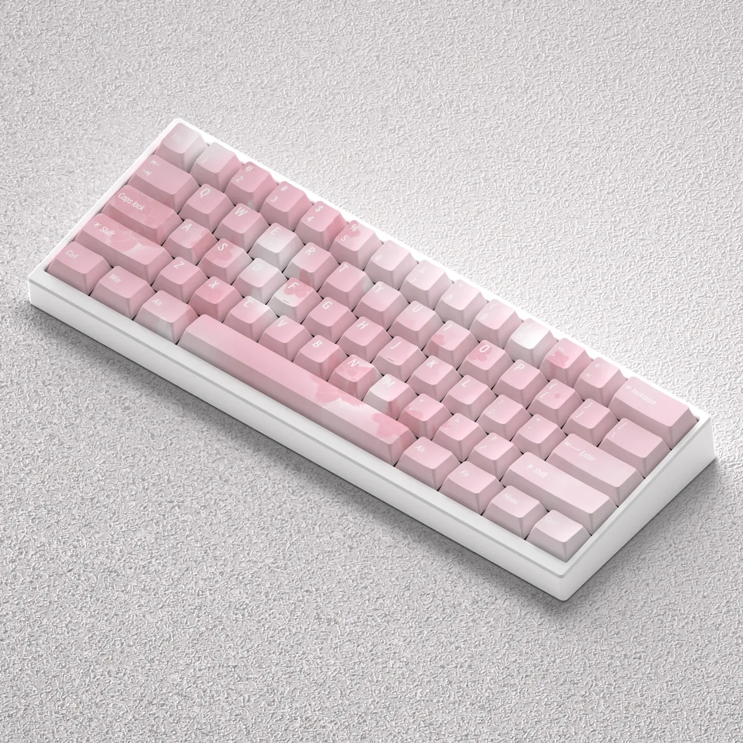 Exquisite PBT Sakura Keycaps set, displaying durable, five-sided dye-sub cherry blossoms from multiple artistic angles. Serene floral beauty.