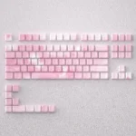 Elegant Sakura Keycaps Set, PBT side-lit, artfully display delicate pink and white cherry blossoms and clean backlit legends on a mechanical keyboard.