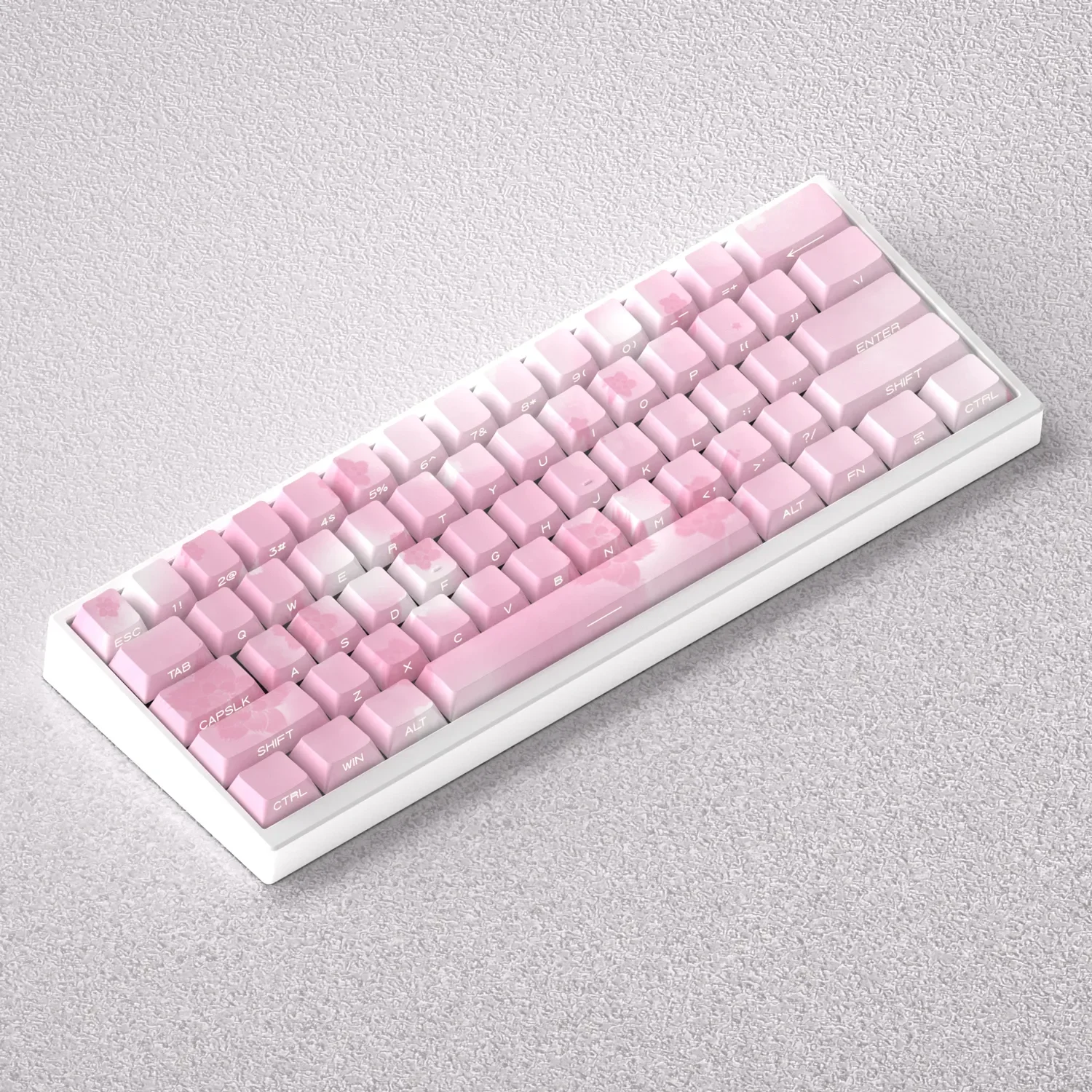 A collection of elegant Sakura Keycaps Set, showcasing the PBT side-lit design with delicate pink cherry blossoms against a serene white palette.
