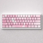 Exquisite Sakura Keycaps PBT set, side-lit with delicate pink and white cherry blossoms for mechanical keyboards.