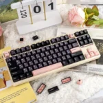 Full set of Ethereal Night Sakura Pink translucent PBT+PC double-shot keycaps set, elegantly showcased from various angles with a dreamy moonlight glow.