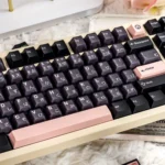 Ethereal Night Sakura Pink Translucent PBT+PC Double-Shot Sakura Keycaps full set displayed from various angles, highlighting their delicate hues.