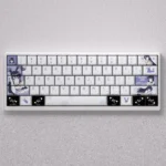 A full set of exclusive Sakurajima Mai PBT keycap set displayed from various angles, highlighting the elegant anime artwork and cool blue-grey aesthetic.