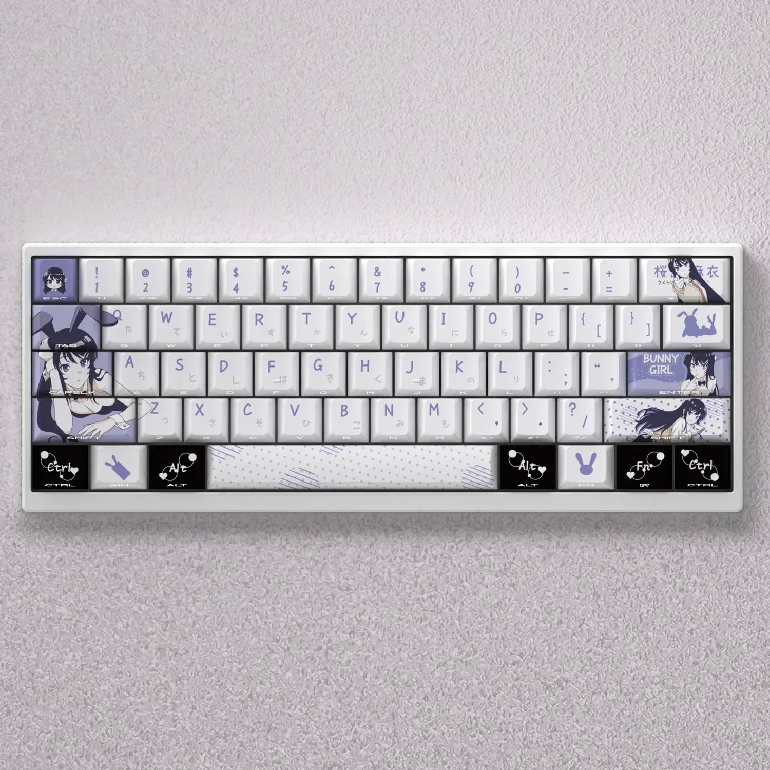 A full set of exclusive Sakurajima Mai PBT keycap set displayed from various angles, highlighting the elegant anime artwork and cool blue-grey aesthetic.