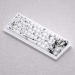 Gallery of the elegant Demon Slayer Shinobu Keycap Set, featuring its custom butterfly anime motif and intricate artistic details from multiple angles.