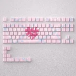 Enhance your keyboard with these 98 pink Oath keycaps set featuring side-engraved, light-transmissive characters for a soft glow.
