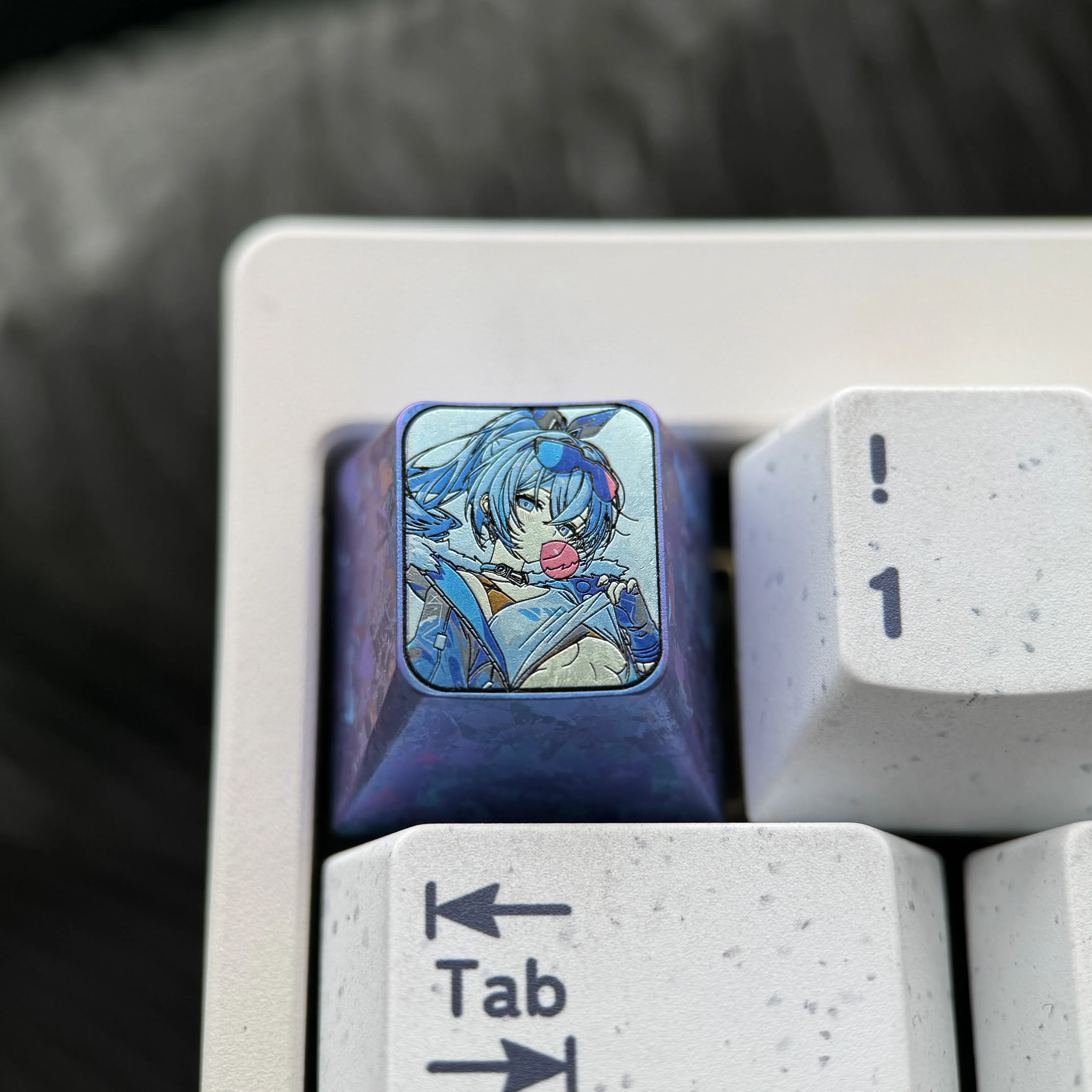 Multiple angles of the premium titanium Silver Wolf keycap, showcasing its metallic finish and detailed cyber-hacker aesthetic for Honkai Star Rail.