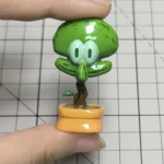 Whimsical Squidward Potted Plant artisan keycap from a new angle, revealing its unique handcrafted resin details.