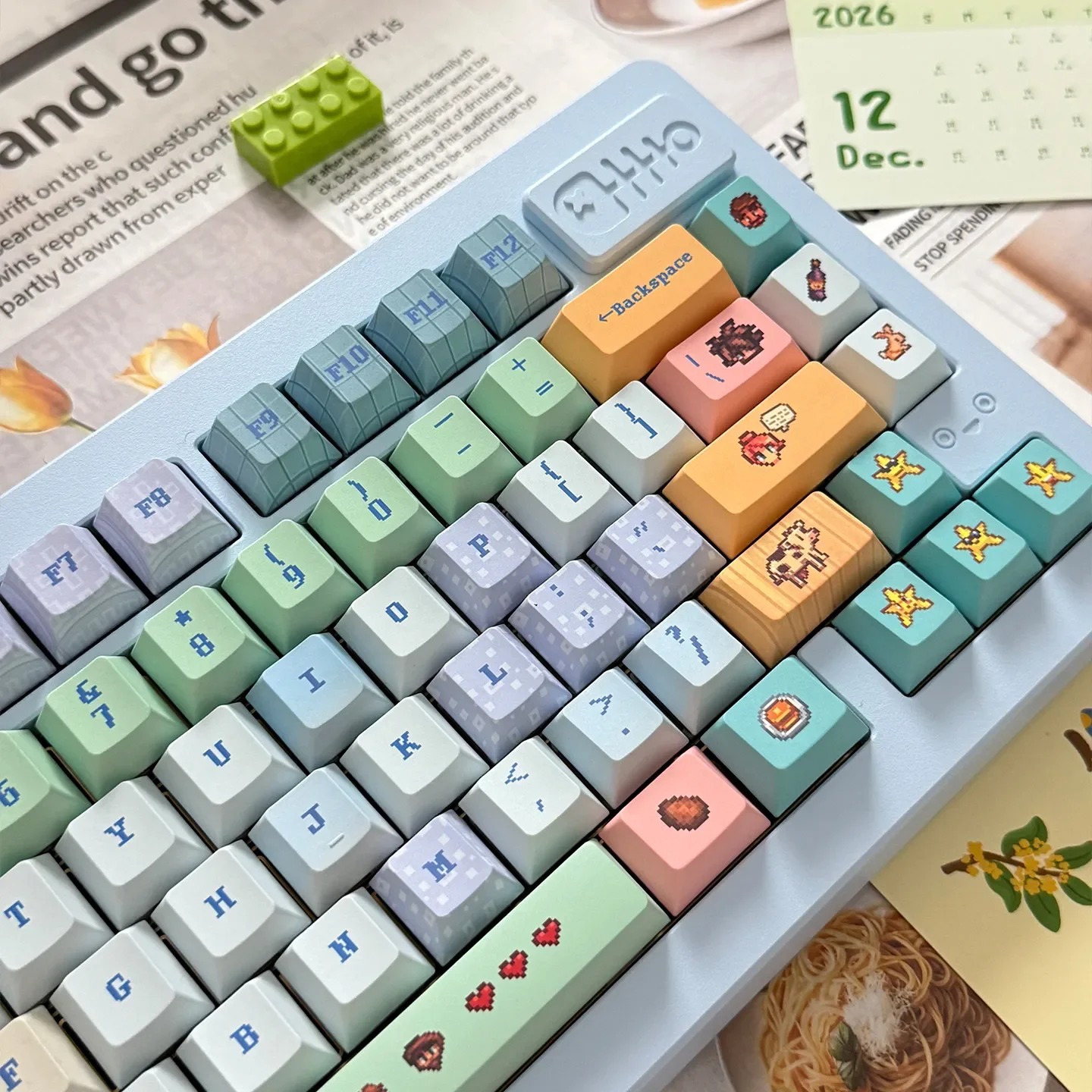 Vibrant Stardew Valley pixel art PBT keycaps set, shown from multiple angles. Features charming characters, tools, and landscapes for nostalgic design.