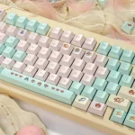 Multiple angles of the Stardew Valley R2 pixel art keycaps set, displaying vibrant, charming, and nostalgic game scenes. PBT dye-sub custom keycaps.