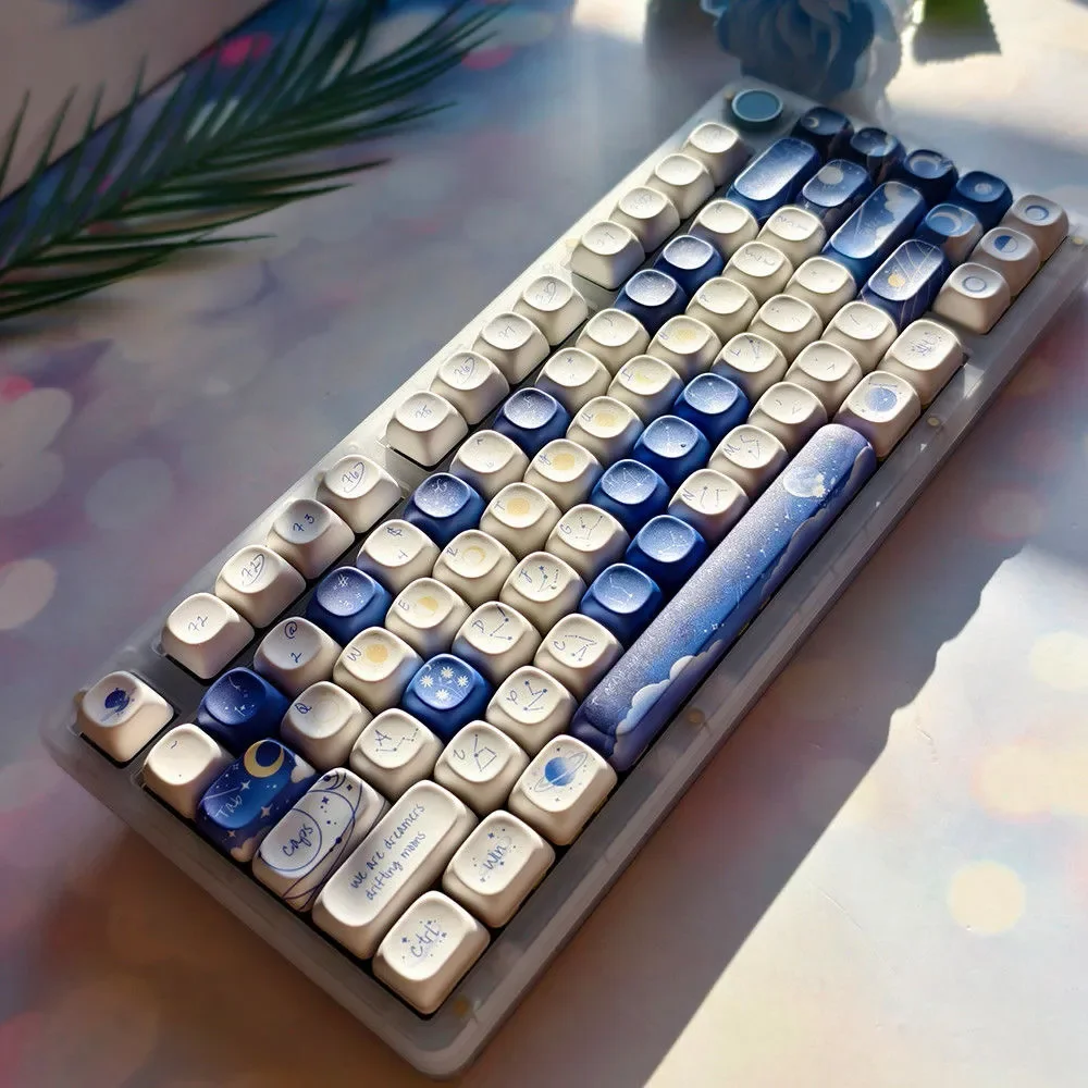 Stunning Starry keycap set, durable PBT spherical keycaps displaying a luminous deep blue cosmos and celestial map for mechanical keyboards.