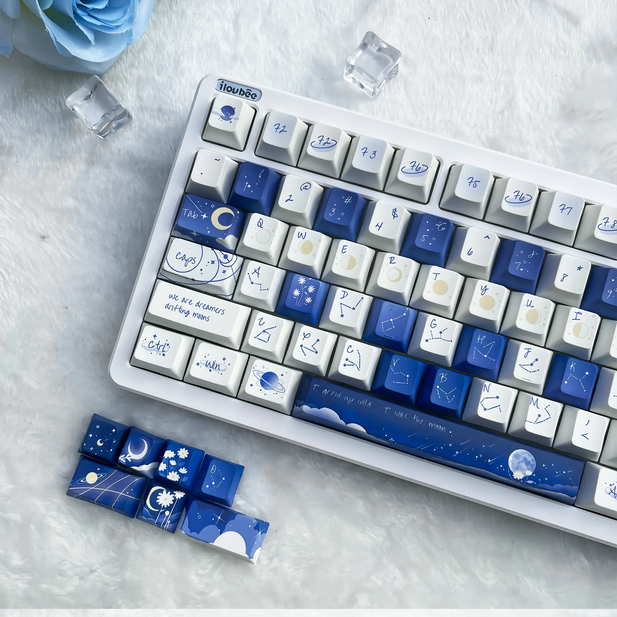 Starry Keycap Set gallery showcasing durable PBT spherical keycaps set. Deep blue cosmic design with twinkling stars and celestial map from various angles.