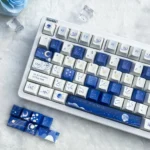 Starry Keycap Set for mechanical keyboards, featuring durable PBT spherical keycaps with a deep blue cosmic design and twinkling stars.