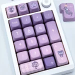 An artistic close-up of the Tears of Themis Marius von Hagen keycaps set, revealing the exclusive, sophisticated character motifs and elegant game-inspired.