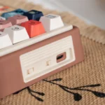 Product gallery of the UR82 Vintage Cream Fantastic Beasts themed mechanical keyboard kit. See gasket mount hot-swappable and magical RGB keycap.