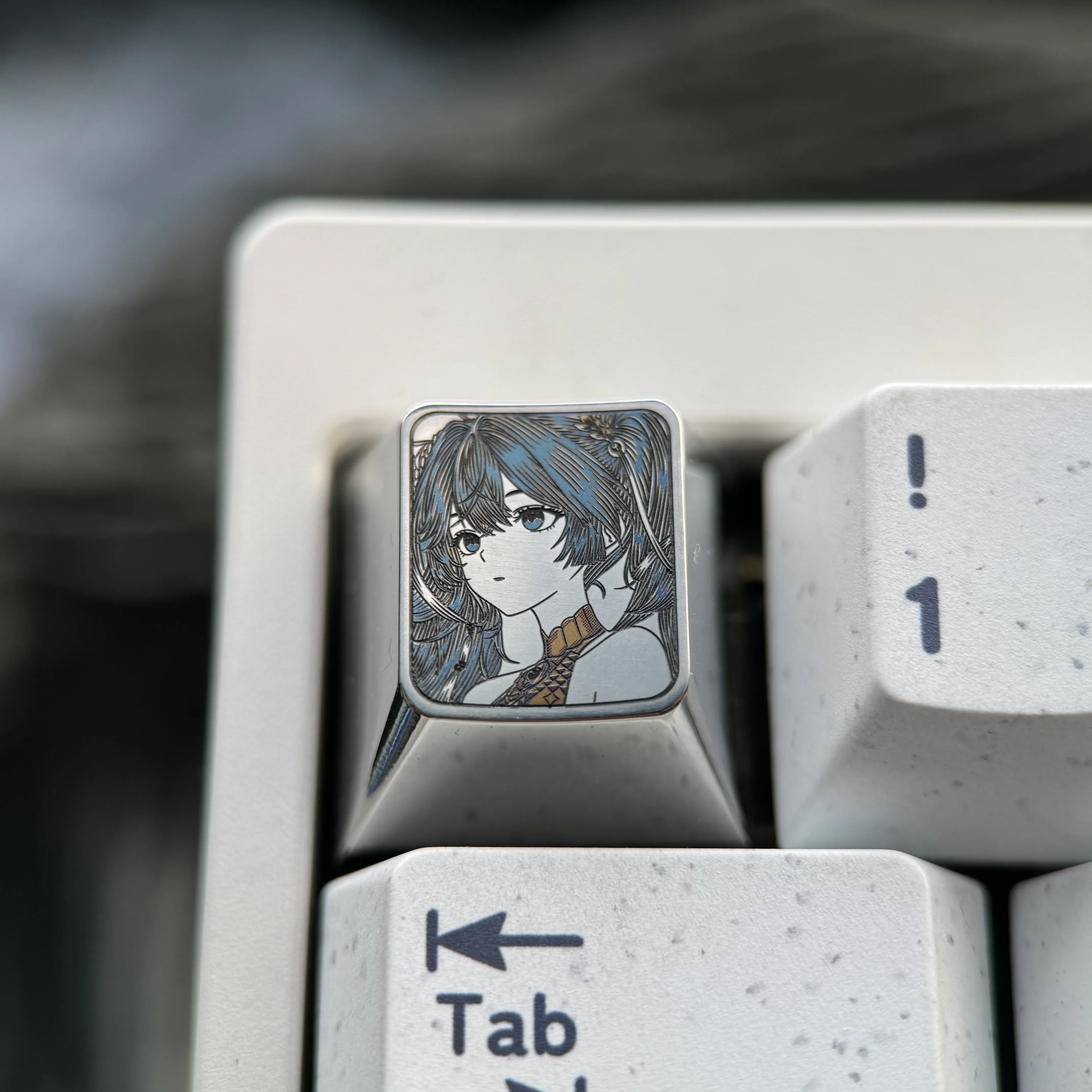 Explore the artisan Wuthering Waves: Iuno Keycap gallery, revealing intricate precision-engraved detail and polished titanium finish from multiple angles