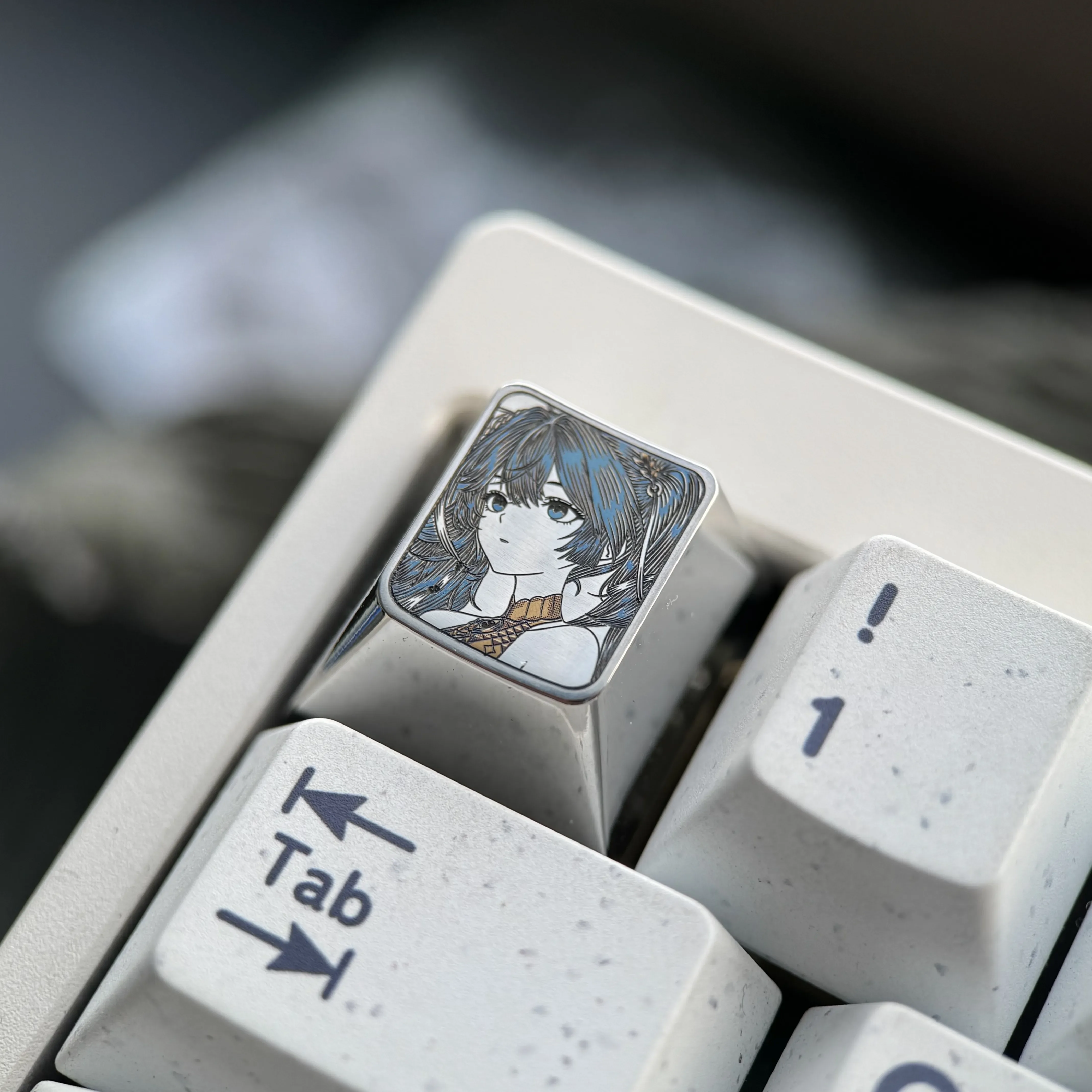Precision-engraved Wuthering Waves: Iuno Keycap gallery, highlighting intricate character art and vibrant detail on polished titanium from various angles.