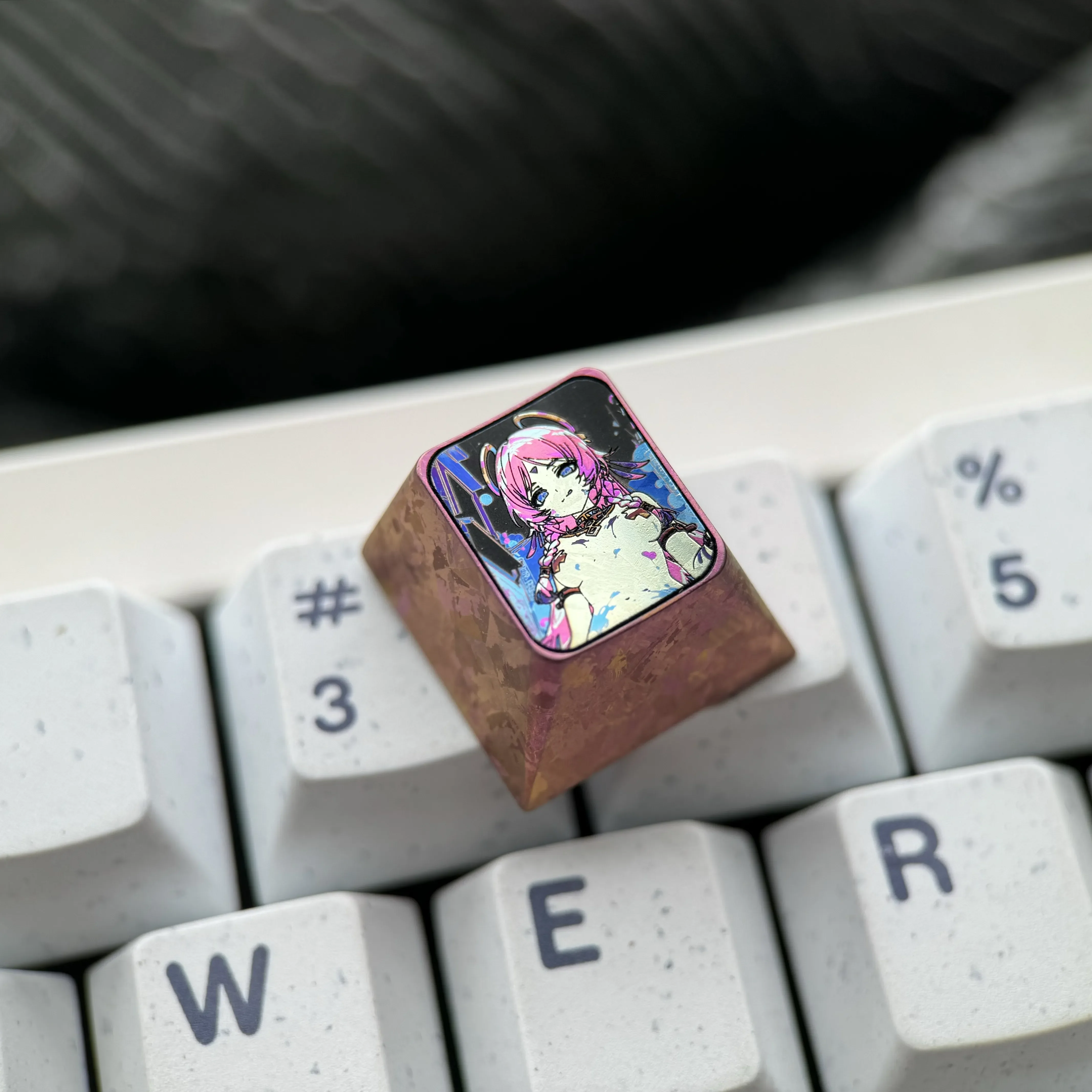 Citlali Premium Titanium Anime Keycap gallery, showcasing vibrant character art, metallic luster, and intricate artisan details from various angles.