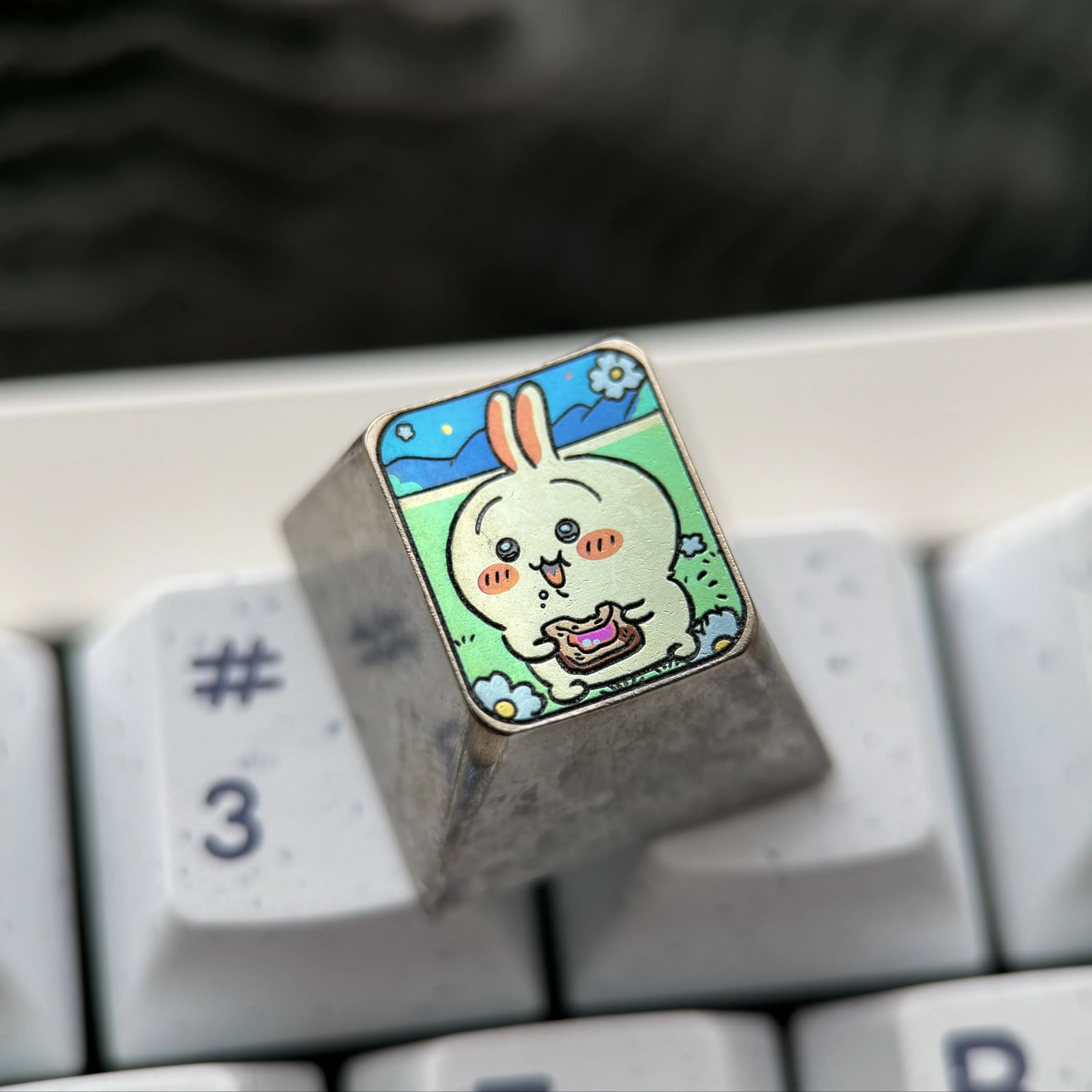 Stunning main image of a Premium Titanium Anime Keycap, showcasing the artistic Usagi design and vibrant metallic finish of this unique ESC keycap.