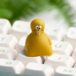 A collection of handcrafted Tom Jerry resin artisan keycaps from various playful angles, showcasing their whimsical 3D design and nostalgic cartoon characters.