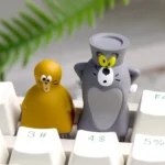 Close-up of a whimsical handcrafted Tom Jerry resin artisan keycap, bringing nostalgic cartoon charm to your mechanical keyboard.