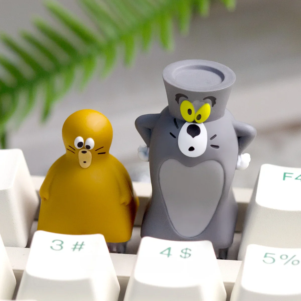 Close-up of a whimsical handcrafted Tom Jerry resin artisan keycap, bringing nostalgic cartoon charm to your mechanical keyboard.