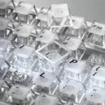 Multiple views showcasing the Ethereal Frosted Translucent PC Keycaps Set, emphasizing their stunning backlit aesthetics and vibrant RGB light diffusion.