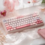 UR82 Peach Hifi Gasket Tri-Mode Custom Mechanical Keyboard Kit displayed from various angles, showcasing its soft pastel peach and cream aesthetic.