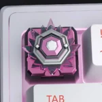 Artistic handcrafted Valorant Rank 3D resin keycap, a vibrant gaming masterpiece showcasing iconic ranks encased in glossy, clear resin.