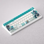 Exclusive Valorant Sage-themed PBT keycap set, showcased with its iconic green hues and healing motifs from various detailed perspectives.