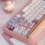 Velvet Frosted Strawberry PBT+PC Translucent Keycaps set, artfully displayed from various angles, revealing ethereal glow and sweet frosted texture.