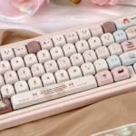 Velvet Frosted Strawberry Keycaps PBT+PC set, artfully showcased from diverse angles. Highlighting the translucent glow and sweet whimsical frosted design.