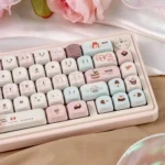 Gallery view of Velvet Frosted Strawberry Keycaps Set, highlighting PBT+PC translucent material from artistic angles, revealing sweet ethereal glow.