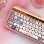 Velvet frosted strawberry keycaps set displayed from various artistic angles, showcasing their translucent PBT+PC material and whimsical, ethereal glow.