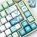 Exclusive Venti Anemo Whimsy FOA PBT keycap set gallery. Multiple views showcase the ethereal teal, white, and gold dye-sub PBT keycaps featuring wind design.
