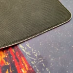 Product gallery views of the large Volcano Gaming Desk Mat highlight its immersive volcanic design, showcasing dramatic molten lava and fiery power.