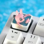 An adorable handcrafted Lipu Friends: Whimsical Characters Keycaps exquisitely detailed in translucent resin for captivating mechanical keyboards.