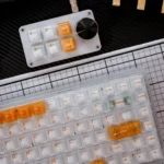 Gallery of White Orange Mist Cherry Keycap Setin a dreamy white and orange aesthetic, shown from multiple artistic angles.