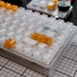 White Orange Mist Cherry Keycap Set gallery, revealing the refreshing white and orange aesthetic from diverse angles.