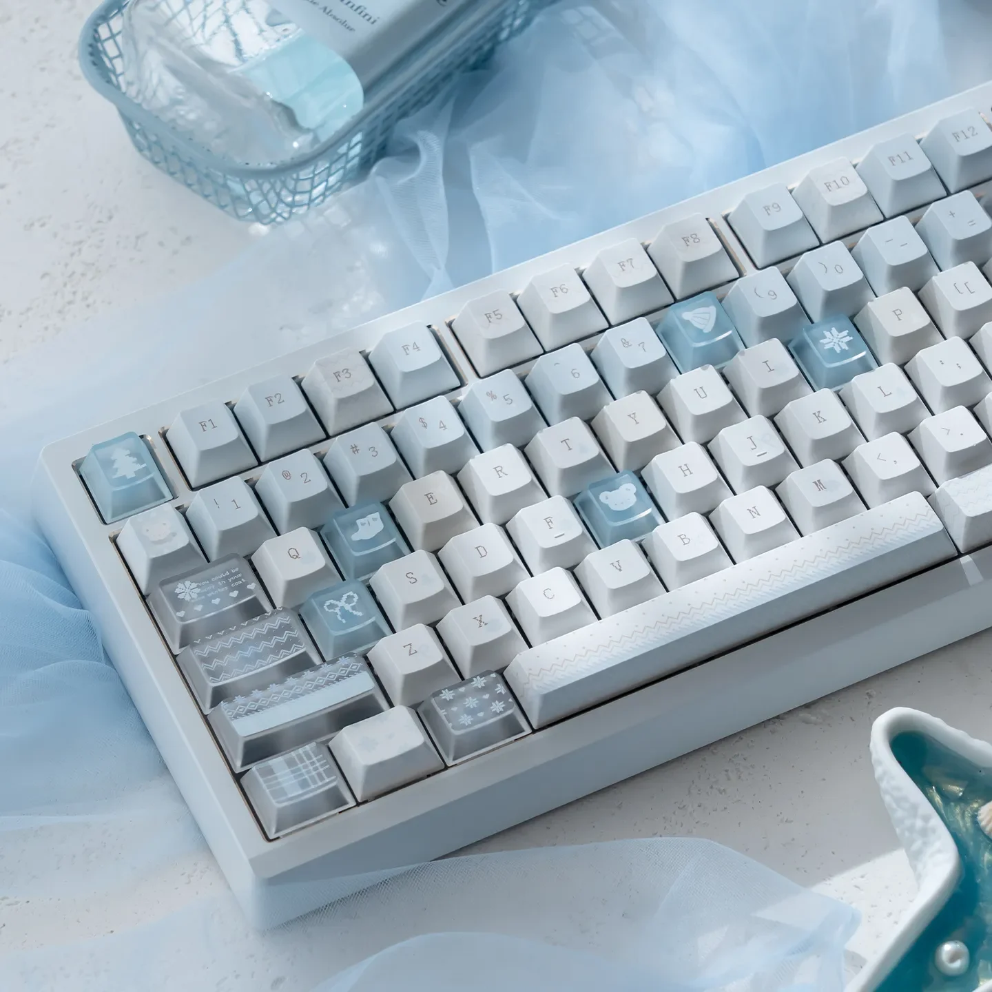 Winter Letter Keycaps Set, PBT+PC, showcasing unique dye-sublimated snow and letter designs across multiple angles. Reflects a tranquil, cozy winter design.