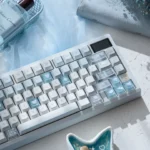 Winter Letter PBT+PC Dye-Sub Keycaps Set showcasing unique soft blue/white artistic design, evoking tranquil winter for custom mechanical keyboards.