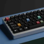 Ag1921 Braun-inspired PBT Wooting keycaps set in a gallery, shown their sleek minimalist industrial design, dark tones, and precise legends.