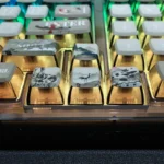 Exquisite Jiangnan Wuxia ink wash art PBT pudding keycaps set displayed from various angles, revealing intricate traditional Chinese landscapes.