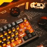 Gallery of X-Era Dream Boundary Keycap Set, highlighting front-engraved translucent PC with vibrant orange accents. Dark, futuristic sci-fi aesthetic.