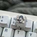 Artistic gallery views of the Ryo Yamada titanium ESC keycap, highlighting precision-engraved anime art, vibrant character details.