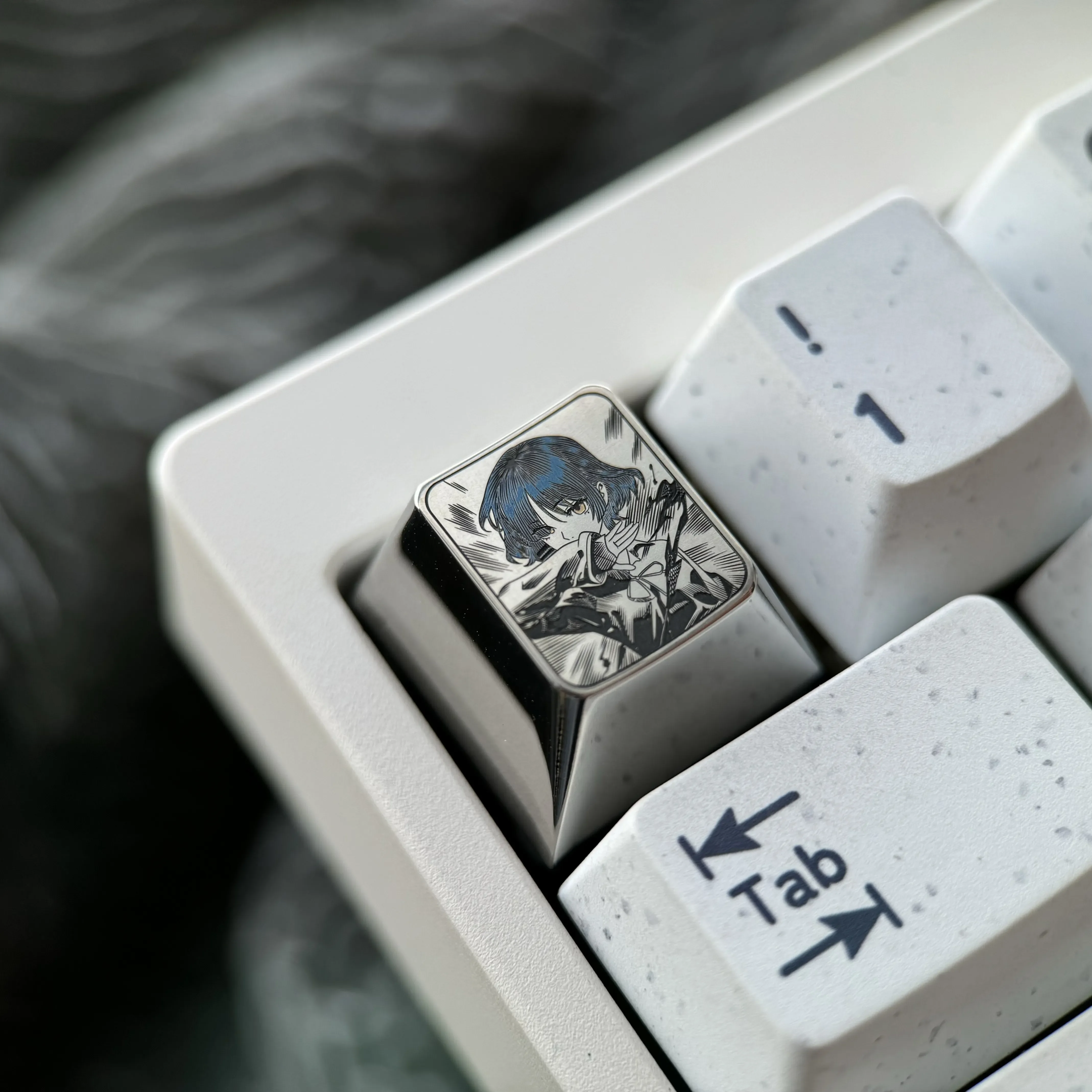 Gallery of Ryo Yamada Titanium ESC Keycap, displaying its vibrant, precision-engraved anime art and premium titanium craftsmanship from all angles.
