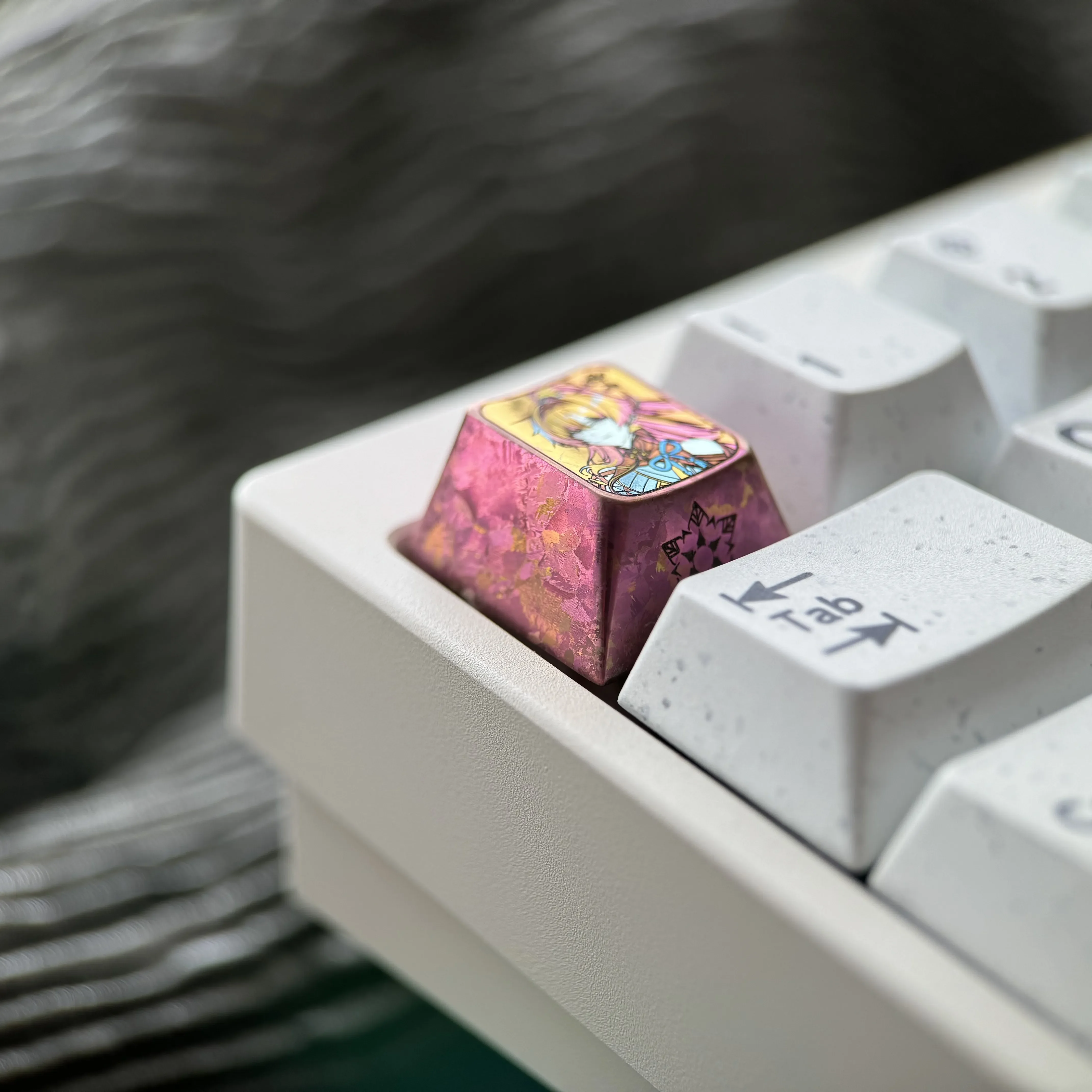 Premium Yinlin titanium alloy anime ESC keycap from various angles, showcasing its intricate Wuthering Waves design and vibrant finish.