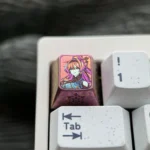 Exclusive Yinlin titanium alloy keycap for Wuthering Waves fans, displaying its intricate anime ESC design and vibrant premium finish.