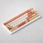 Fiery Spirit Yoimiya Keycap Set gallery, highlighting exclusive Genshin Impact PBT designs, vibrant colors, and playful character art from all angles.